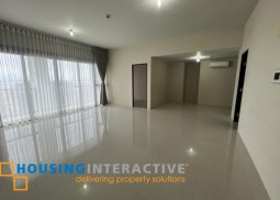 a semi-furnished 4br unit with balcony for rent in uptown ritz residence