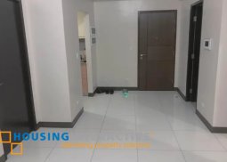 a semi-furnished 2br unit with balcony for sale in the florence