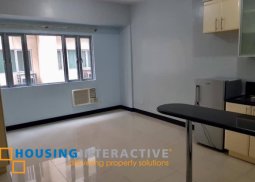 semi-furnished studio condo unit in morgan suites executive residences, taguig city for sale