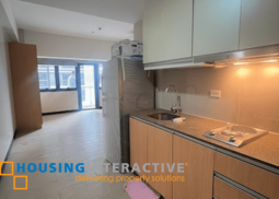 a semi-furnished studio unit with balcony for sale in salcedo skysuites