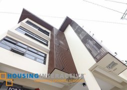 buillding bounded by 3 streets with old improvement for sale