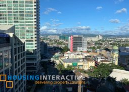 a semi-furnished 2br unit with balcony for sale in eastwood lafayette 1