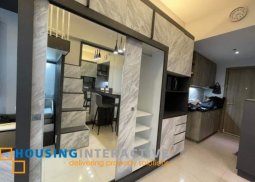 renovated 1br to studio unit for lease in fame residences, mandaluyong
