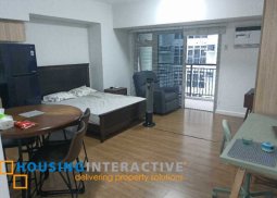 a fully furnished studio unit with balcony for lease in verve residences