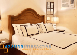 a fully furnished 2br unit for sale in the grove by rockwell