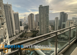 semi-furnished 2br unit with balcony for sale in acqua private residences