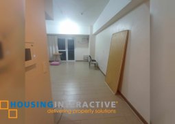 semi-furnished studio unit with balcony for lease at the venice luxury residences