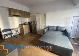 semi-furnished studio unit for sale at the rise