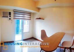 semi furnished 1br condo unit for sale at the trion towers bgc