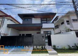 for sale brand new modern tropical 2 story house in an exclusive village in bf homes.