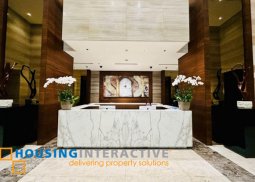 bare condition 3br unit with parking for sale at two roxas triangle