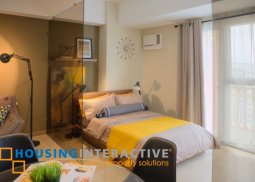 fully furnished studio unit with balcony for lease at the venice luxury residences