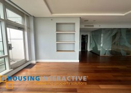 semi-furnished 3br unit with parking for sale in one roxas triangle
