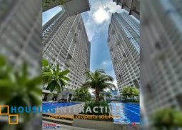 semi-furnished 1br unit with balcony and parking for sale in allegra garden place