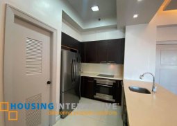 semi-furnished 2br unit with  balcony for sale in the manansala, rockwell