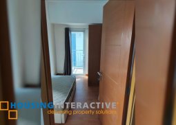 fully furnished 1br unit with balcony for sale in the trion towers
