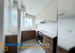 semi-furnished 3br unit with parking for sale in edades tower