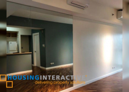 semi-furnished 1br unit with parking for sale in the manansala