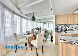 fully furnished 1be unit with parking for sale in one rockwell