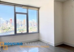 semi-furnished 2br unit with parking for sale in the proscenium at rockwell