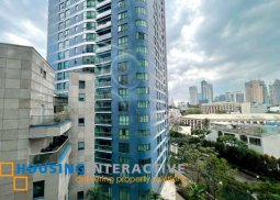 fully furnished 2br unit with parking for sale in amorsolo square