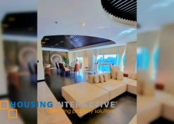 fully furnished 4br unit with parking for sale in raffles residences