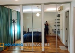 midcentury fully furnished 2-bedroom unit for sale in bonifacio ridge