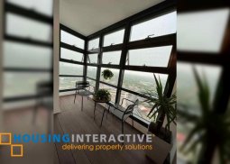 fully furnished 2br unit with balcony and parking for sale in garden towers