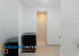 semi-furnished 2br unit with parking lot for lease in one rockwell