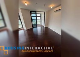 semi-furnished 2br unit with parking for sale in garden towers