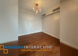 semi furnsihed 3br unit with parking for sale in one roxas triangle