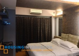 fully furnished 1br unit with balcony for sale in one rockwell