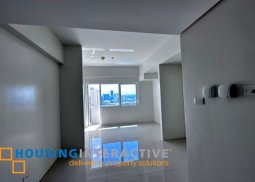 studio unit with balcony for sale in 100 west makati