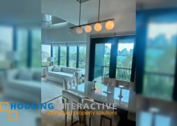 semi-furnished 1br unit with parking for sale in one rockwell