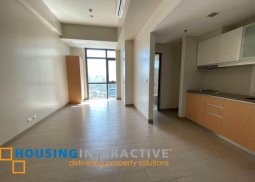 studio unit with parking for lease in one eastwood ave.