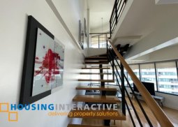 semi-furnished 2br unit with parking for lease in one rockwell