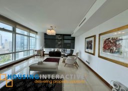 semi-furnished 3br unit with parking for slae in two roxas triangle