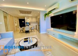 furnished 3br unit with parking for lease in one roxas triangle