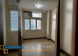 a semi-furnished 1-bedroom unit at san antonio residences