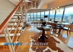 fully furnished 2be unit with parking for sale in one rockwell