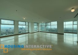 bare 4br unit with parking for sale in two roxas triangle