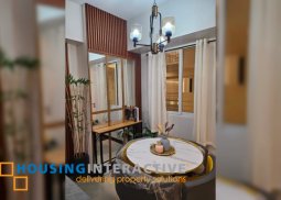 a fancy 2b condominium with balcony in las pinas city