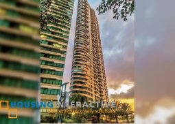 semi-furnished 2br unit with parking for sale in one rockwell