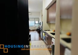 a semi furnished studio unit for sale  in shang salcedo place