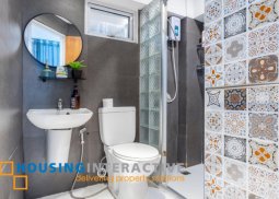 a condominium for sale in fort victoria taguig city