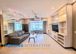 fully furnished 2br unit with parking for sale in one serendra