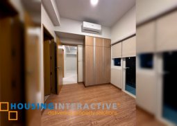 semi-furnished 2br unit with parking for lease in park avenue, bgc