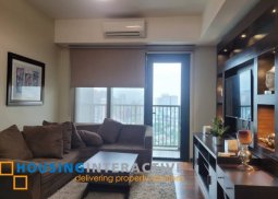 fully furnished 1br unit with balcony for lease in one rockwell