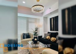 fully furnished 1br unit with balcony and paring for sale/lease in the veranda