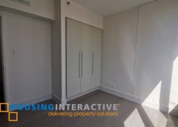 semi-furnished 2br unit with parking for lease in proscenium at rockwell